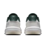 On THE ROGER Clubhouse white and green sneaker side view