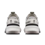On THE ROGER Pro Fire off-white and purple tennis shoe side view