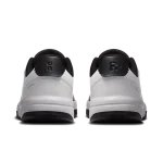 On THE ROGER Clubhouse black and white sneaker side view