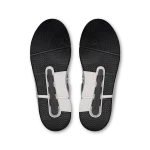 On THE ROGER Clubhouse black and white sneaker side view