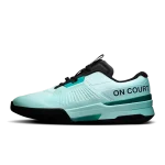 On THE ROGER Pro Fire mint and teal tennis shoe side view
