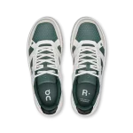 On THE ROGER Clubhouse white and green sneaker side view