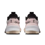On THE ROGER Pro Fire Clay white and pink tennis shoe side view