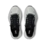 On Cloudtilt Black Ivory women's sneaker side profile with white CloudTec Phase sole
