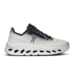 On Cloudtilt Black Ivory women's sneaker side profile with white CloudTec Phase sole