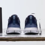 On Cloud Sky 2 Midnight Wolf kids' sneaker side profile with white CloudTec sole