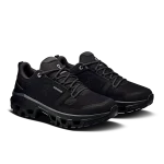 On Cloudrock Low Waterproof Black women's hiking shoe side profile with lugged CloudTec sole